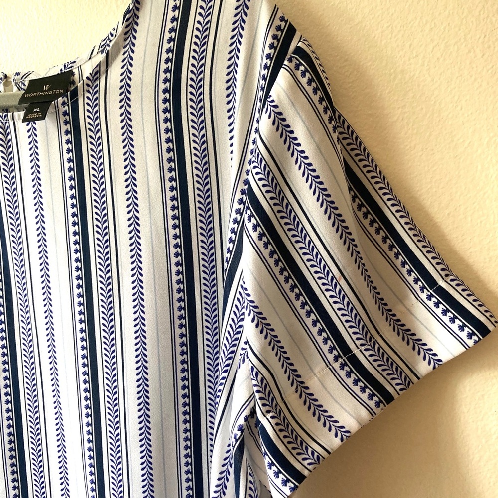 Blue and white stripe shirt with button in back